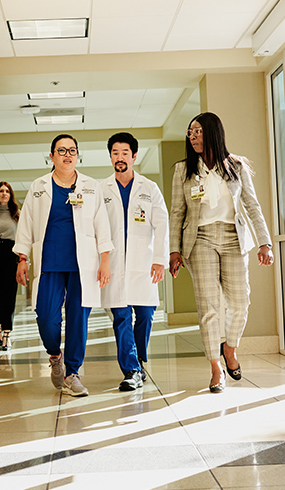 HCA Healthcare staff walks together on campus