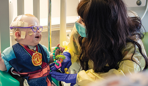 Child Life Specialist cares for a young patient